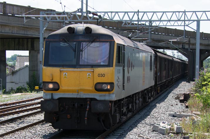 Class 92030 coming under the closed concreat flyover over the west Coast Main Line 