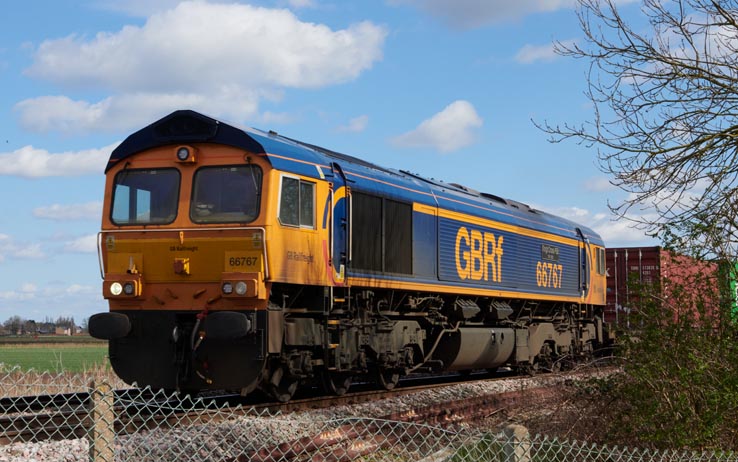 GBRf class 66767 Kings Cross PSB 1971-2021 at Eastrea on Monday 27th of March 2023