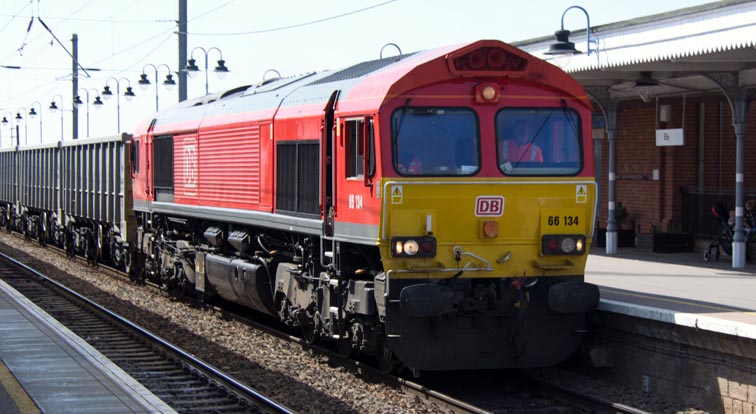 DB class 66134 in DB red at Ely station 