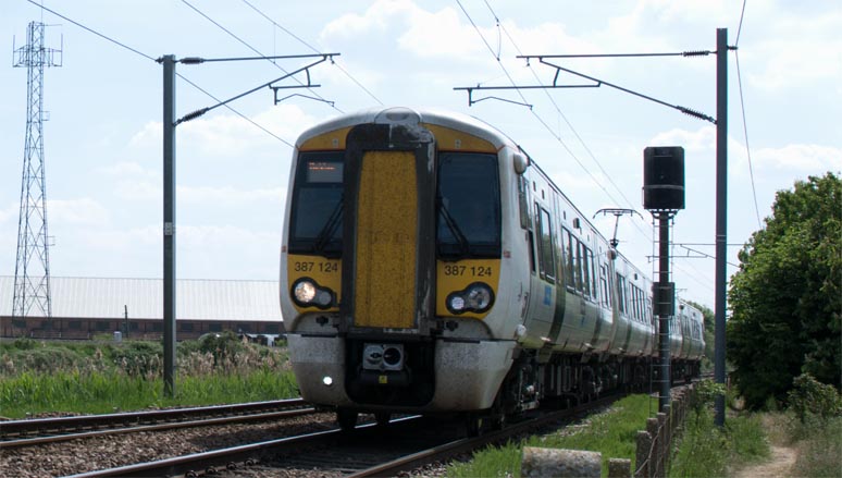 Great Northern class 387 124 on Kings Lynn line at Queen Adelaide 