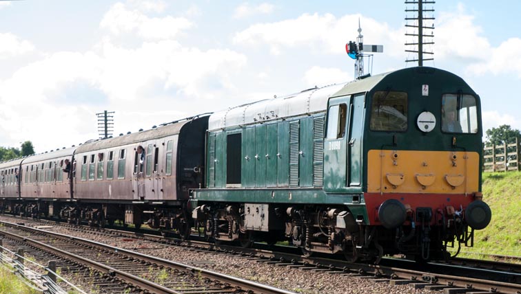 Class 20 in in British Railways green with small yellow warning panel as D5098