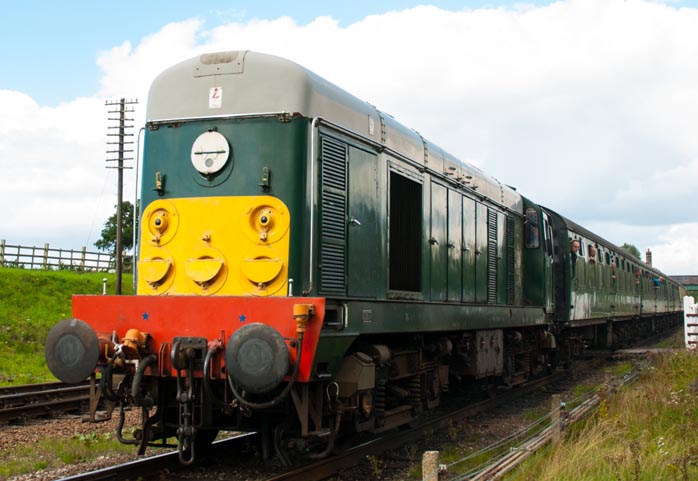 Class 20 in in British Railways green with small yellow warning panel as D5098