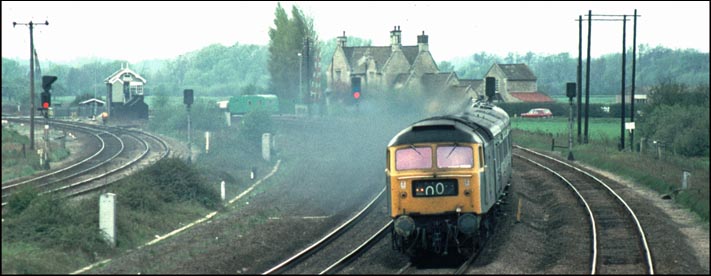 Class 47 on the ECML up fast line between Helpston and Woodcroft crossings gates