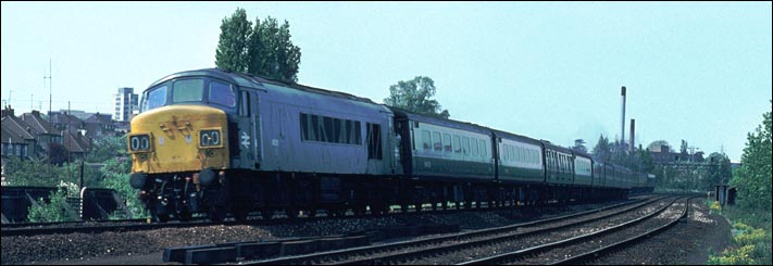 Just to the north of Kettering station a class 45 on a passenger train to London