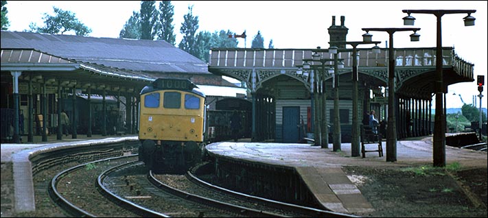 A class 25 on down freight though platform 2 at Kettering station.