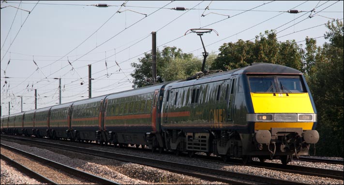 GNER class 91 on a down train on the 10th August 2007 at Lolham level crossing 