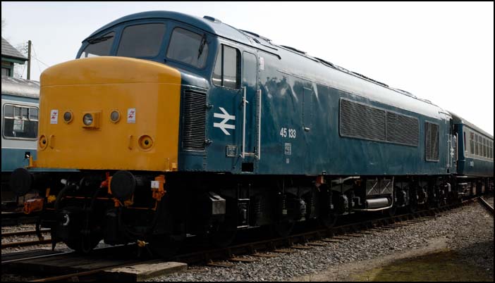 Class 45 133 in BR Blue into Dereham station on Friday 19th March 2010