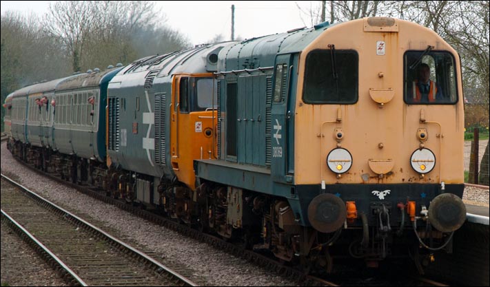 Class 20069 with its old number D069 into  Thuxton  station  with  class  50019  in 2012