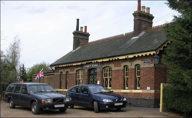 County School station building