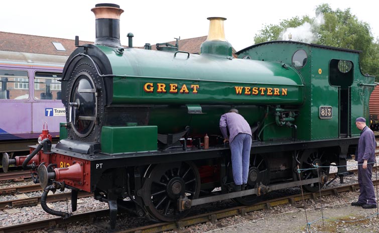 GWR 0-6-0ST 813 at Dereham station oiling and checking between trips to Wymondham Abbey 