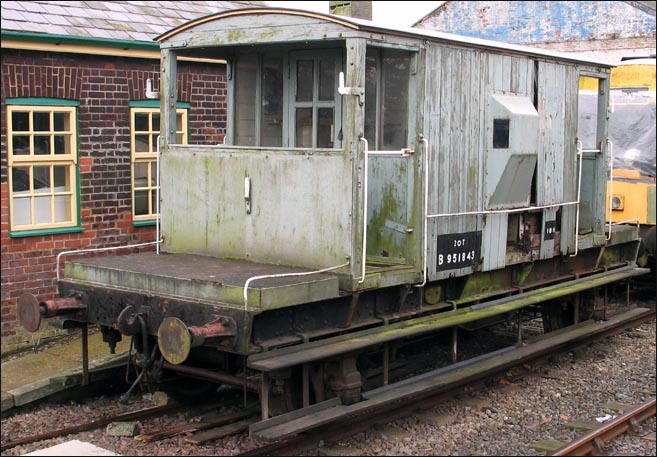 Brake van was in a well worn state at Dereham station in 2006.