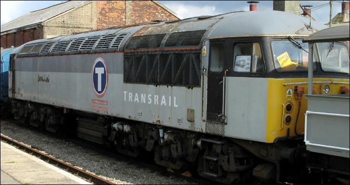 Class 56040 in well worn Transrail colours at Dereham station in September 2006