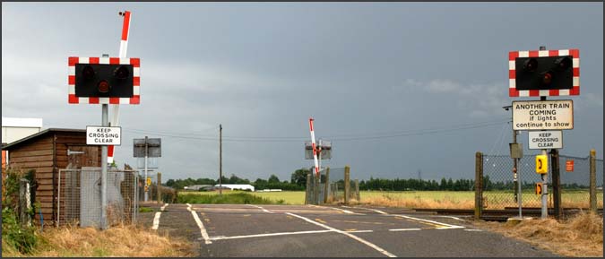 Level crossing on a small road near March   