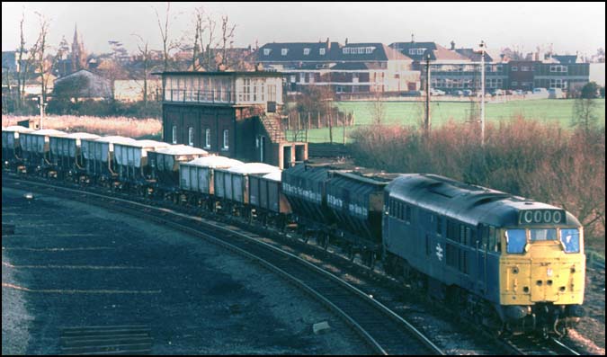March Whitemoor with a class 31 on a sand train past the March North box