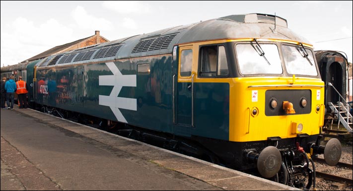 Class 47 292 with large BR arrows in Dereham station on Friday 21st of September 2012