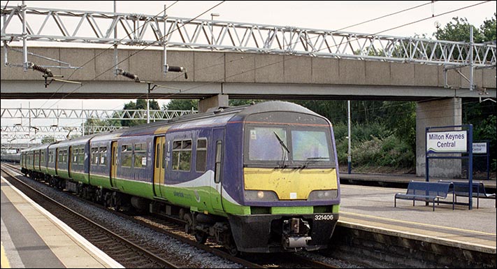 Siverlink County class 321406 into Milton Keynes Central station in 2005  