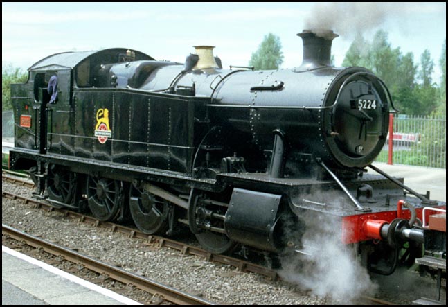 GWR 5224 in BR black at Orton Mere with a freight in 2002