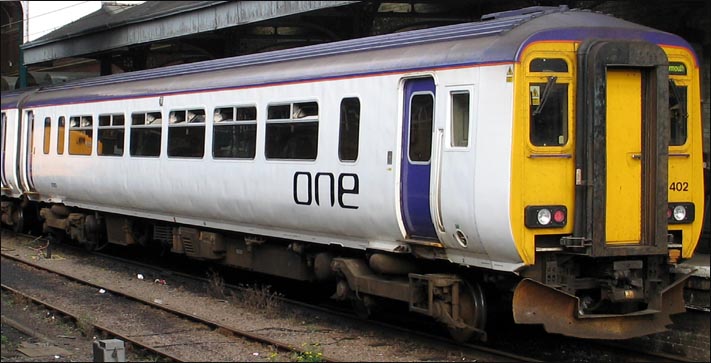 One class 156402 in white in 2005 in Norwich Station