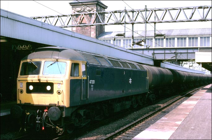 Class 47 221 in Nuneaton station in BR days on a tanker train