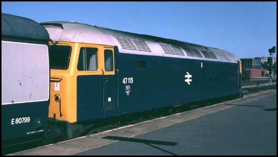 Class 47115 with a sliver roof in platform 5 at Peterborough