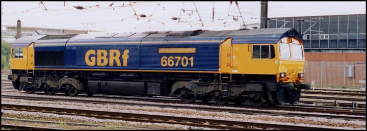 GBRf 66701 Railtrack National Logistics light engine near to the power box at Peterborough 2003
