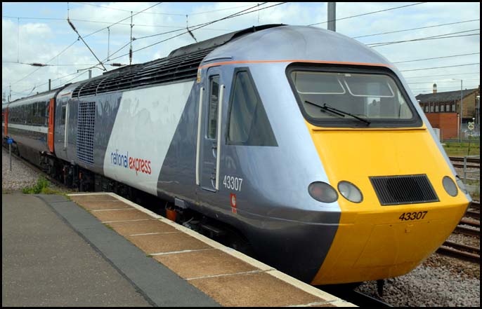 NXEC 43307 at rear of a train out platform 4 at Peterborough 