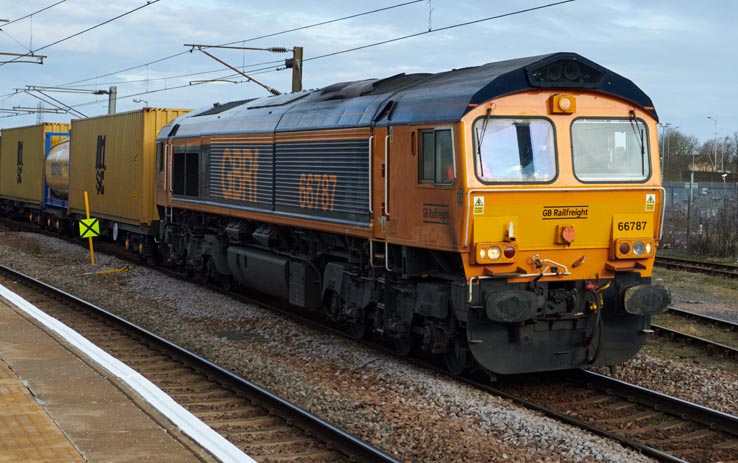 GBRf class 66787 into platform 1 on the 12th February 2022 .