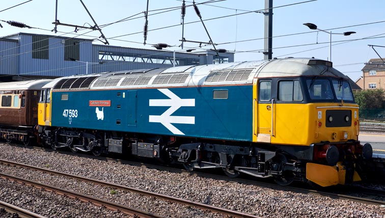 Class 47593 was at the other end  of the train  in Platform 4 at Peterborough station on 16th of April  in 2022