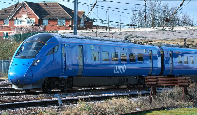 Lumo 803 002 coming into Peterborough station on the 18th of March in 2022
