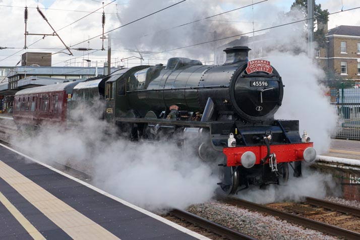 45596 Bahamas with a steam movement leaving Peterborough station on the 4th October in 2021 