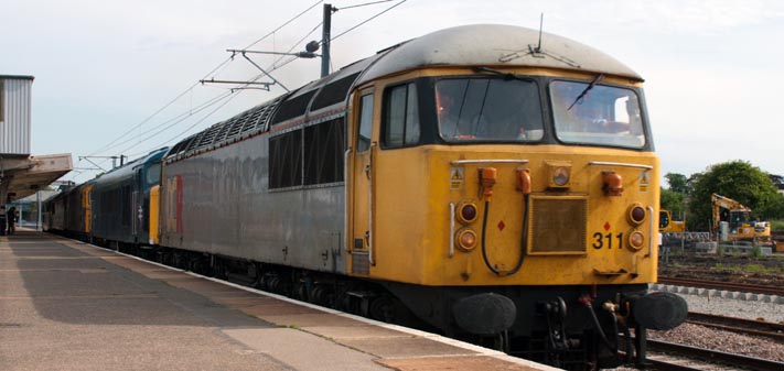 Class 56311 was at the head of a a convoy  of five locomotives came through platform 5 