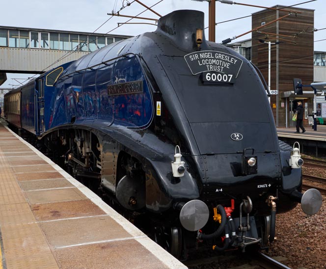 60007 Sir Nigel Greseley  at Peterborough station in platform 4 on 5th of April 2023.
