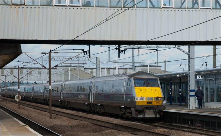 A East Coast train is slowing to stop in the new platform 3 at Peterborough railway station on the 21st of Febuary in 2014