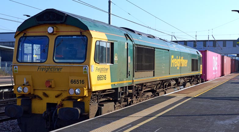 Peterborough station with Freightliner class 66516 in February 2023
