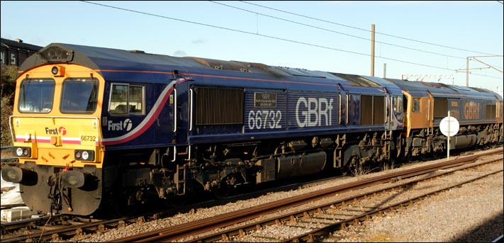 First GBRf class 66732 in the goods loops at Peterborough with First GBRF class 66701 