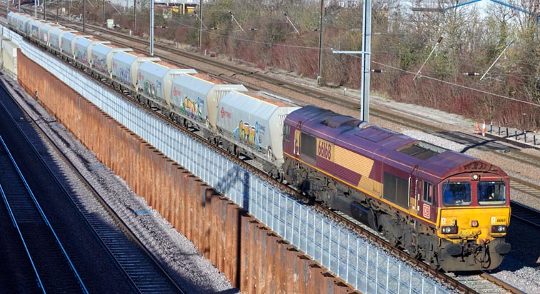 DB class 66168 on the up Leicester Peterborough line on 17th January 2022