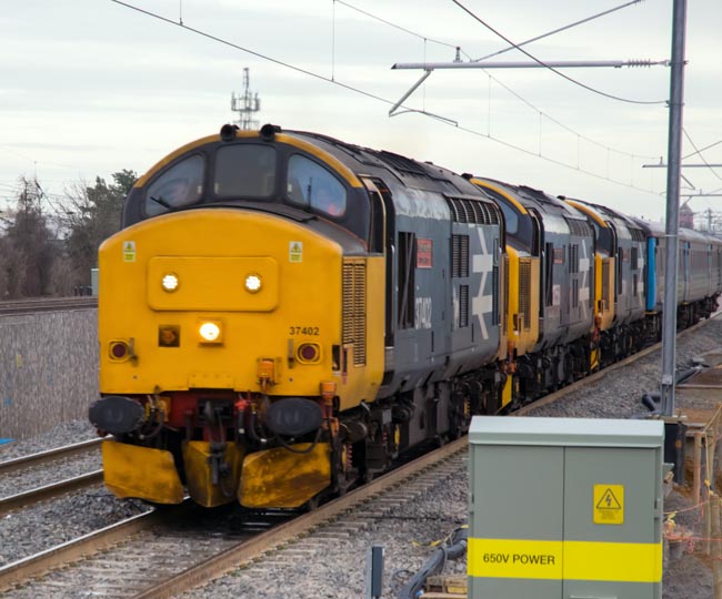Three DRS class 37s with 37402 leading 