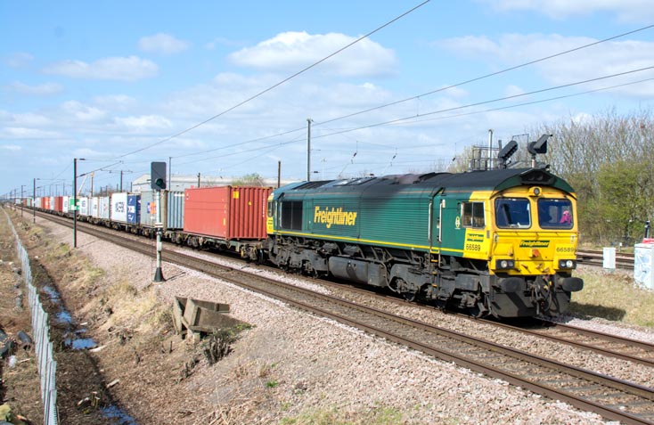Freightliner class 66589 on the Stamford line heading for Peterborough 