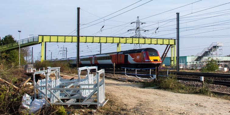 LNER HST on the ECML under the closed footbridge at Werrington on the 15th April 2019