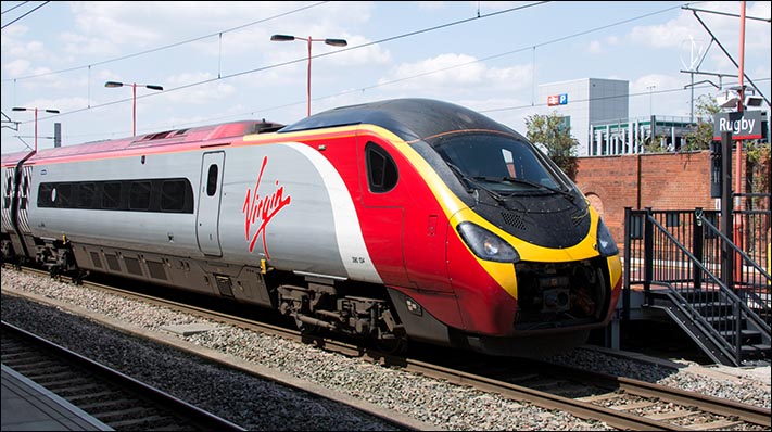Virgin 390 134 on a up train to London Euston a Rugby railway station on Thursday the 24th of July 2014