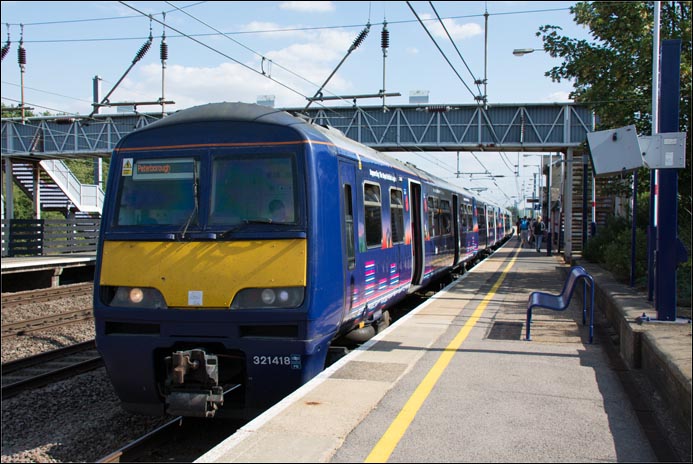 First Capital Conect class 321418 in Sandy station on a train to Peterborough on 29th of July 2014.