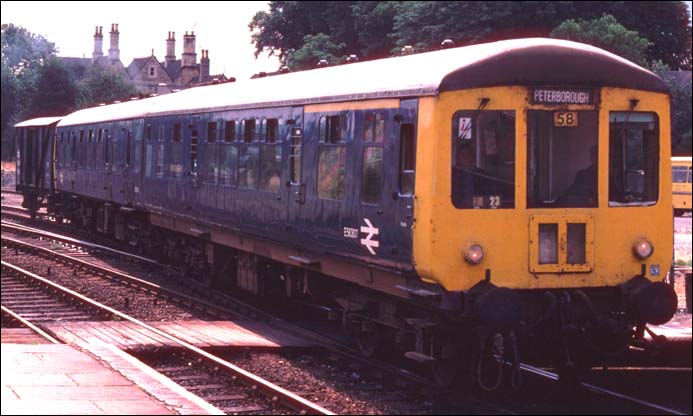 A Peterborough DMU into platform 1 at Stamford station out of the siding near station