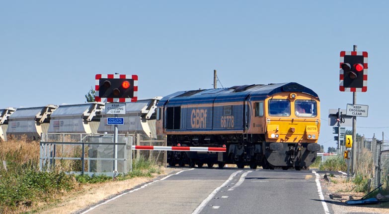 GBRf class 66778 on one of level crossing at Turves on 12th October in  2022 