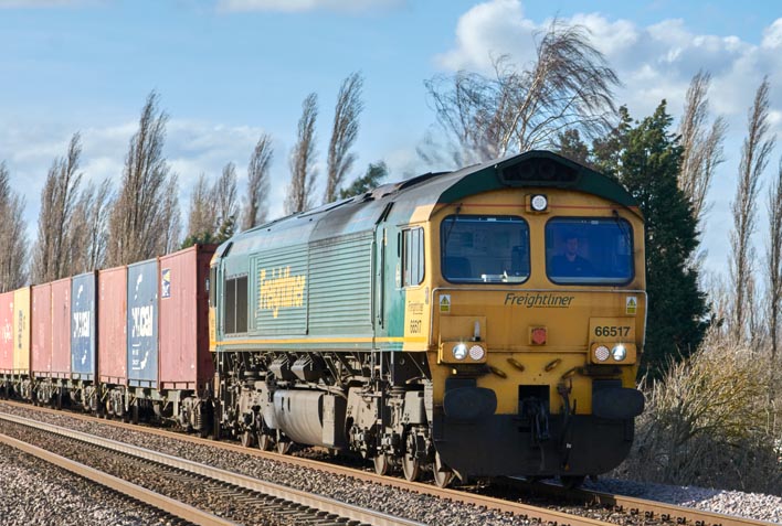 Freightliner class 66753 at Black Bush level crossing Whitlesea on the 9th March in 2022 