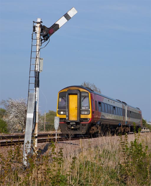 Class 158777 at Whitlesea on the 16th April  in 2022