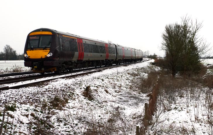 Cross Country class 170 620 at the Ramsey Road crossing on the 9th March 2023