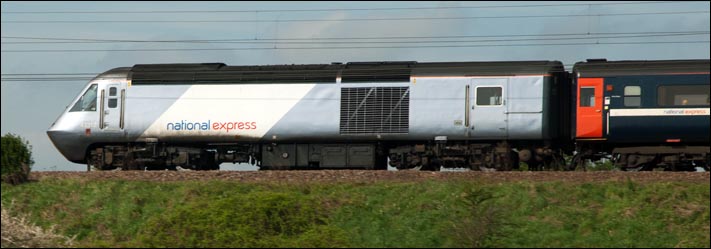 A National Express HST 43312 at Yaxley on a up train.