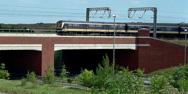 Thamslink EMU over the Bedford bypass bridge in 2001.