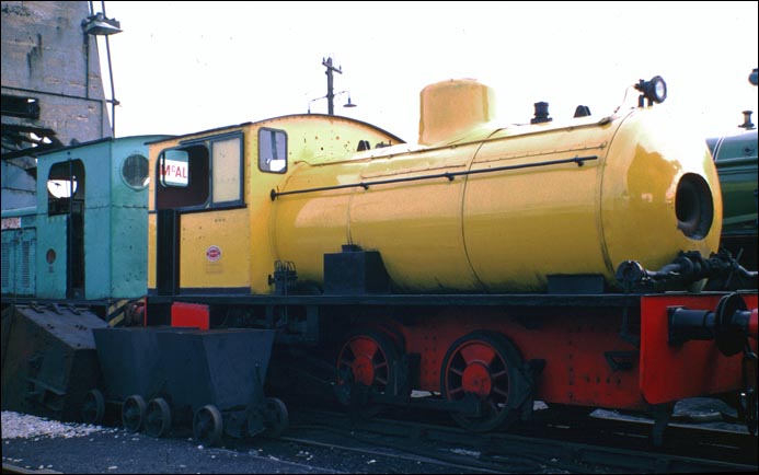 A yellow fireless steam locomotive at Steamtown