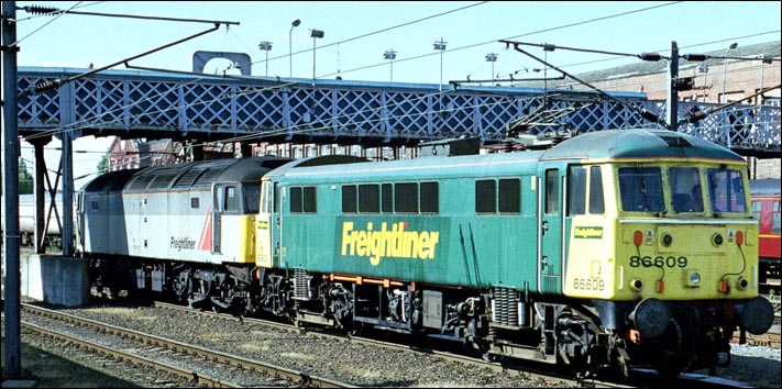 Freightliner class 86609 and a Freightliner class 47 at Doncaster 